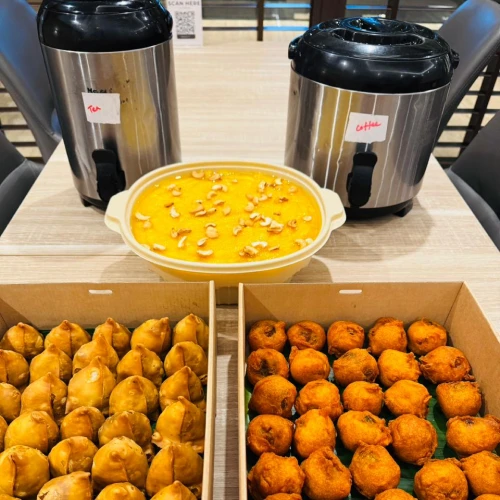 Indian high tea catering in Singapore for birthday parties and special occasions with vegetarian snacks and refreshments.