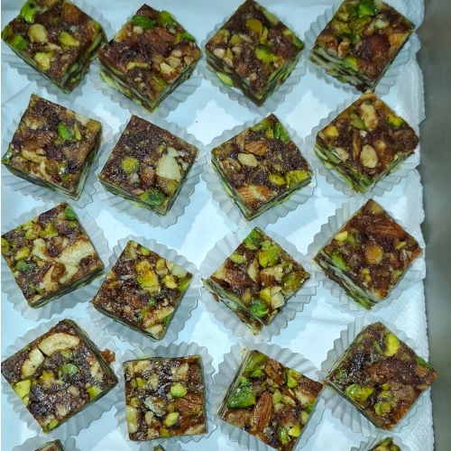  Indian catering in Singapore for Deepavali celebrations, featuring traditional sweets and savoury snacks for festive gatherings.