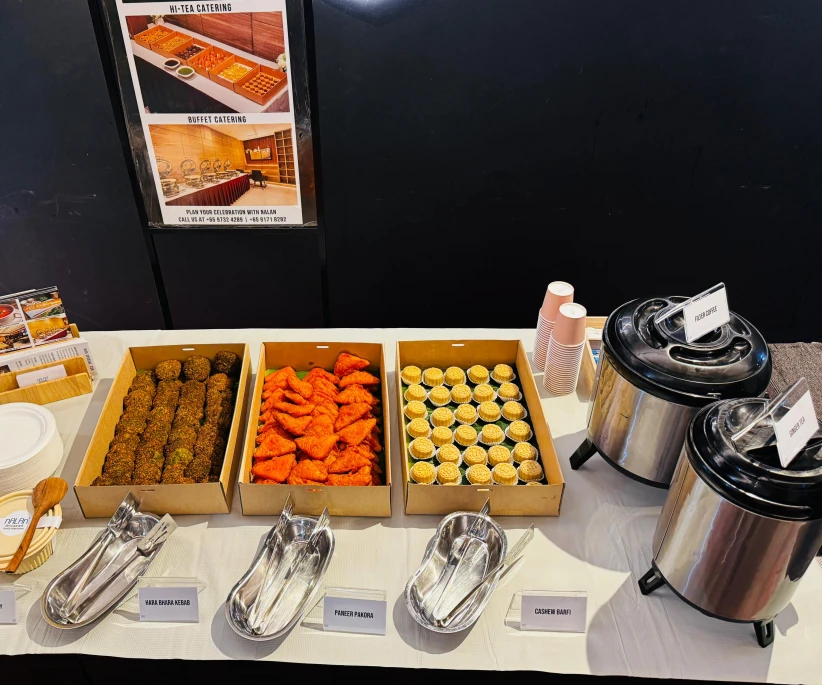 Indian high tea catering for offices in Singapore with vegetarian snacks, traditional sweets and refreshing drinks.