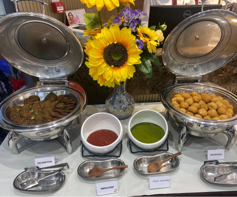  Indian high tea catering in Singapore with vegetarian snacks, traditional sweets and beverages for corporate events.