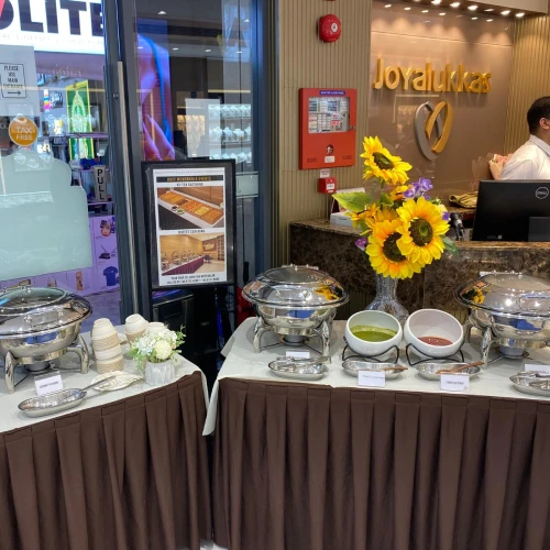 Indian high tea catering for office meetings and training sessions in Singapore, with snacks and beverages for attendees.