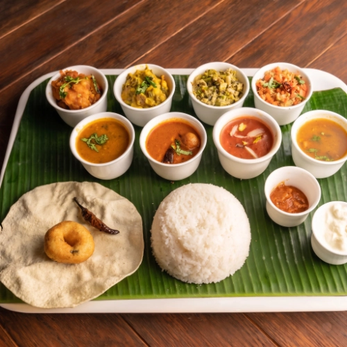 Traditional Indian wedding styled catering with festive dishes and professional event food service