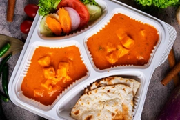 Soft naan served with grilled cottage cheese in a mild curry sauce and a fresh garden salad.