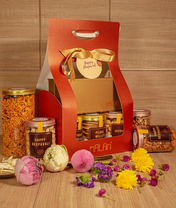 Best Indian Sweets & Snacks Gift Hampers in Singapore Beautiful gift hamper with assorted Indian sweets, snacks, and treats perfect for occasions in Singapore