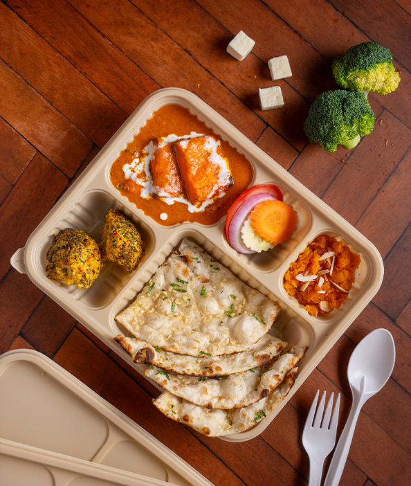 Paneer delight bread meal featuring flavorful paneer and fresh sides for a wholesome dining experience